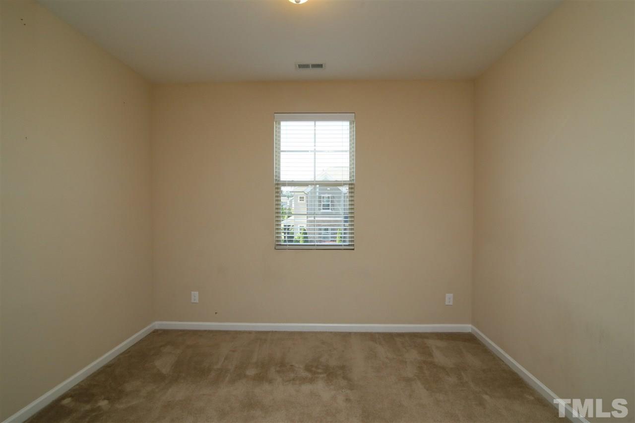 728 Wickham Ridge Road Apex, NC 27539 - Photo 17 of 21 an empty room with a window