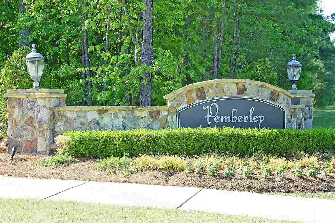 728 Wickham Ridge Road Apex, NC 27539 - Photo 18 of 21 a sign on the side of a road