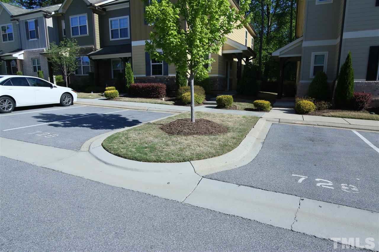 728 Wickham Ridge Road Apex, NC 27539 - Photo 21 of 21 a view of a street with houses on both side of it