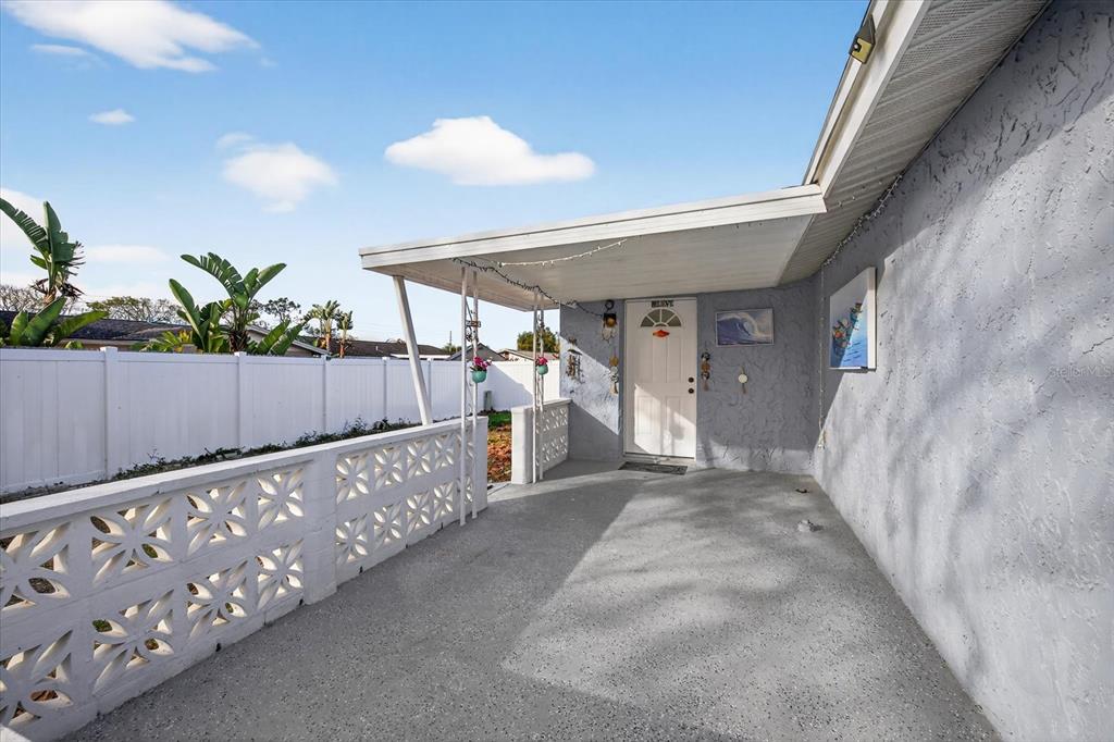 7814 Birchwood Drive Port Richey, FL 34668 - Photo 28 of 33 a view of a porch