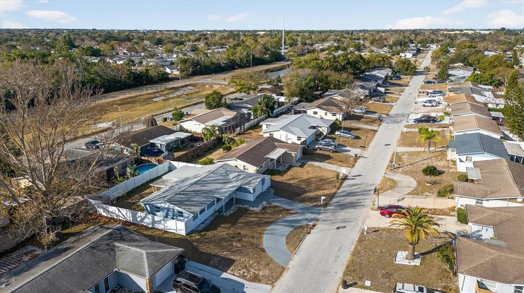 7814 Birchwood Drive Port Richey, FL 34668 - Photo 5 of 33 an aerial view of residential houses with outdoor space