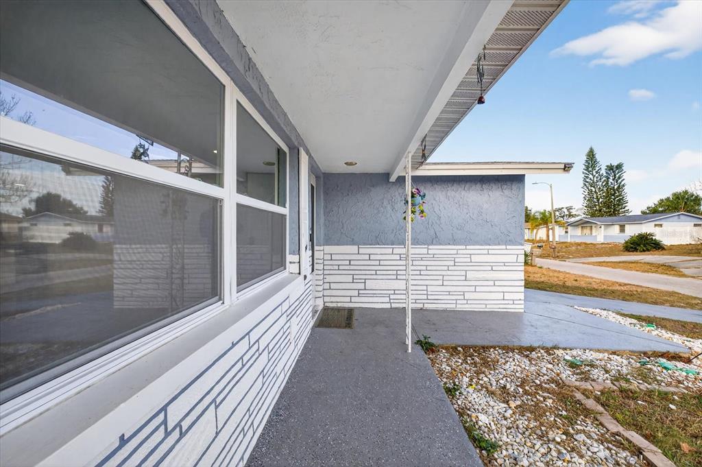 7814 Birchwood Drive Port Richey, FL 34668 - Photo 7 of 33 a view of entryway