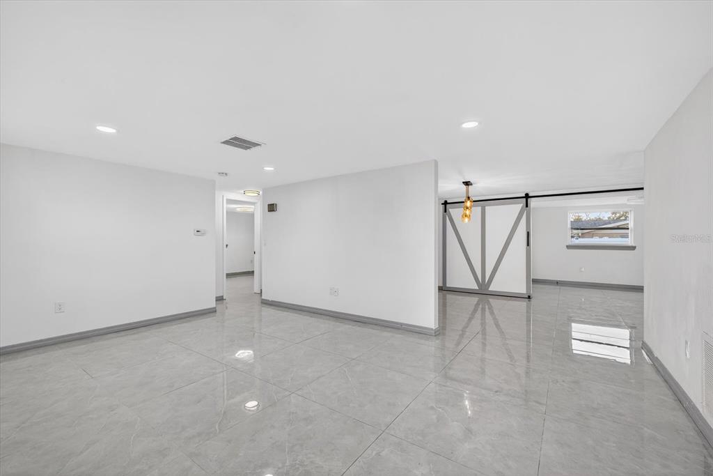 7814 Birchwood Drive Port Richey, FL 34668 - Photo 8 of 33 a view of an empty room