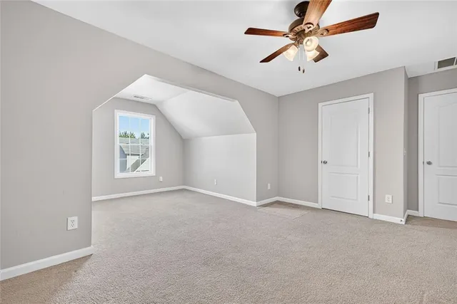 a swimming pool with trees in the background