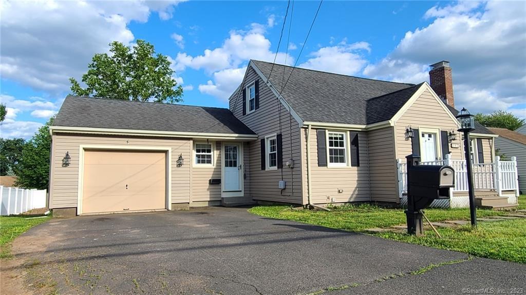 592 Fenn Road Newington, CT 06111 - Photo 1 of 1 a front view of a house with a yard