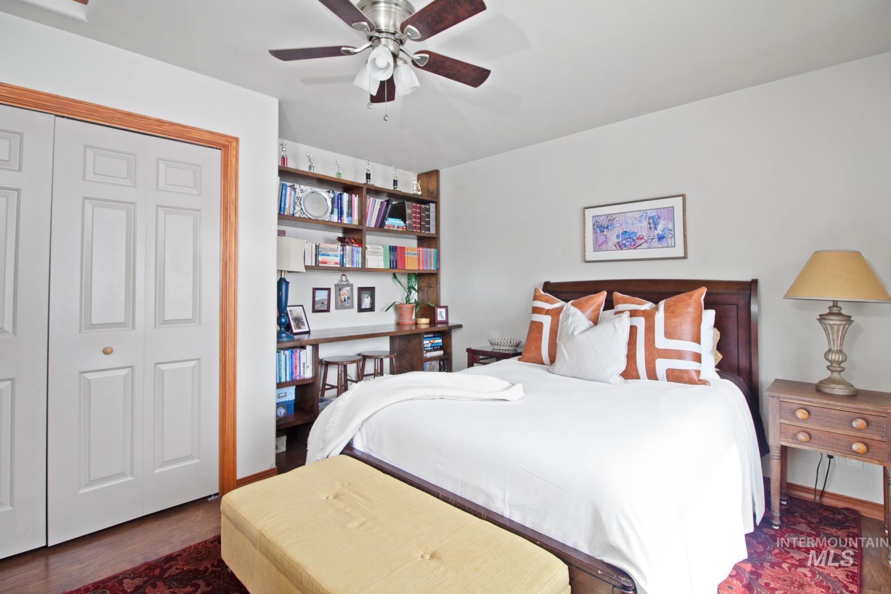 70 Tyler Drive Bellevue, ID 83313 - Photo 14 of 29 Bedroom with dark wood-style flooring, ceiling fan, and a closet