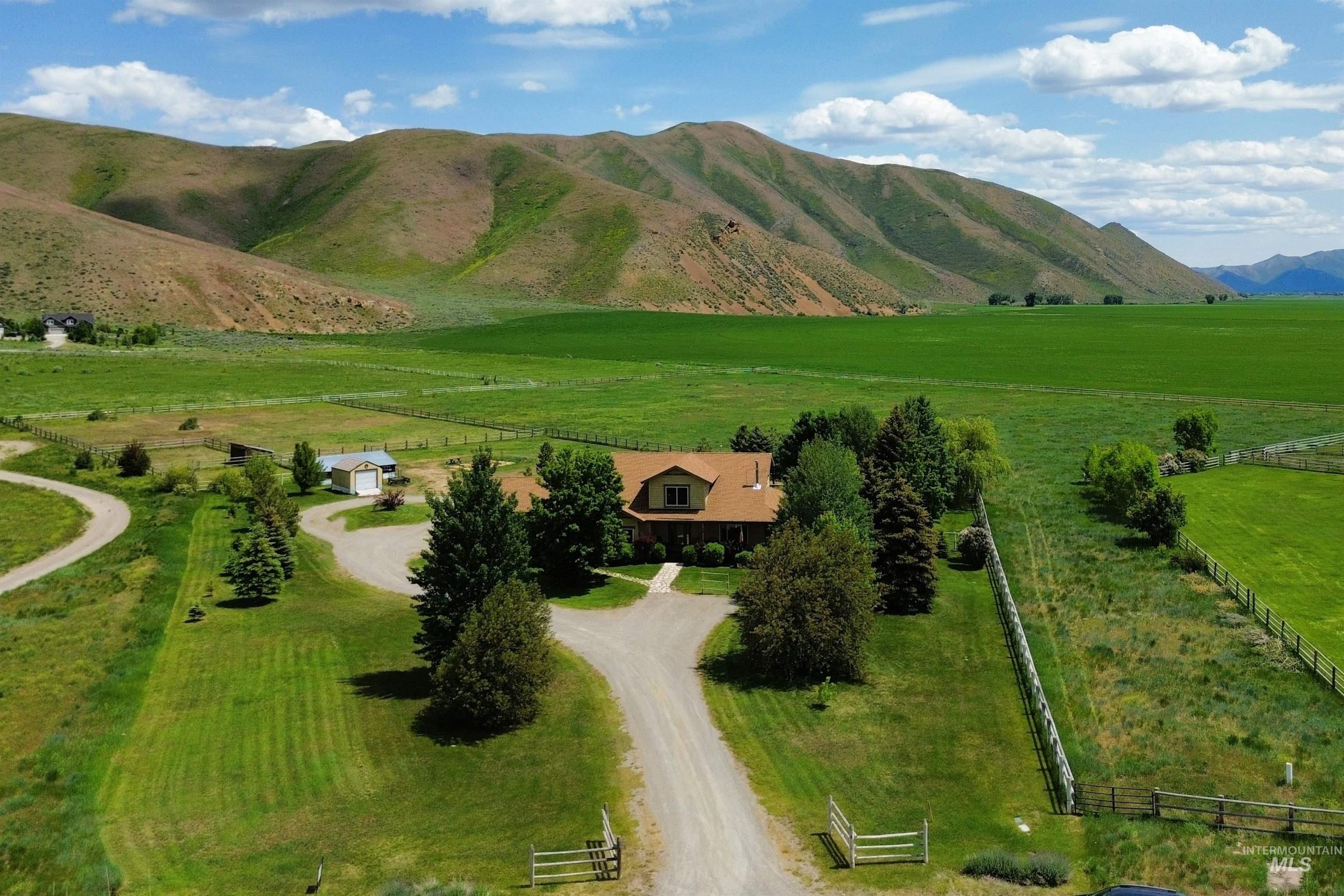 70 Tyler Drive Bellevue, ID 83313 - Photo 4 of 29 View of mountain backdrop with a pastoral area and rural landscape
