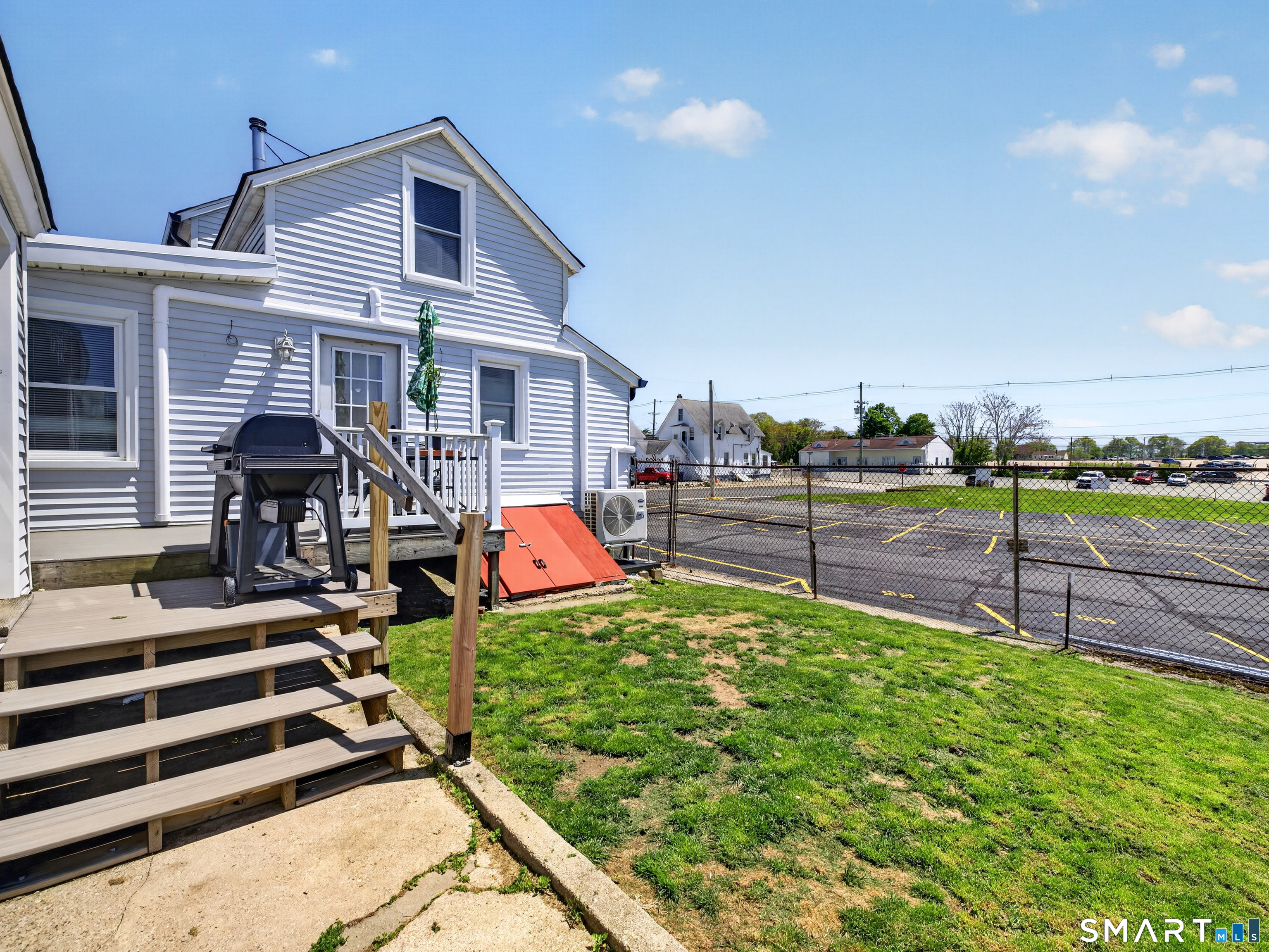 13 Oak Street Groton, CT 06340 - Photo 30 of 38 a view of a house with backyard and sitting area