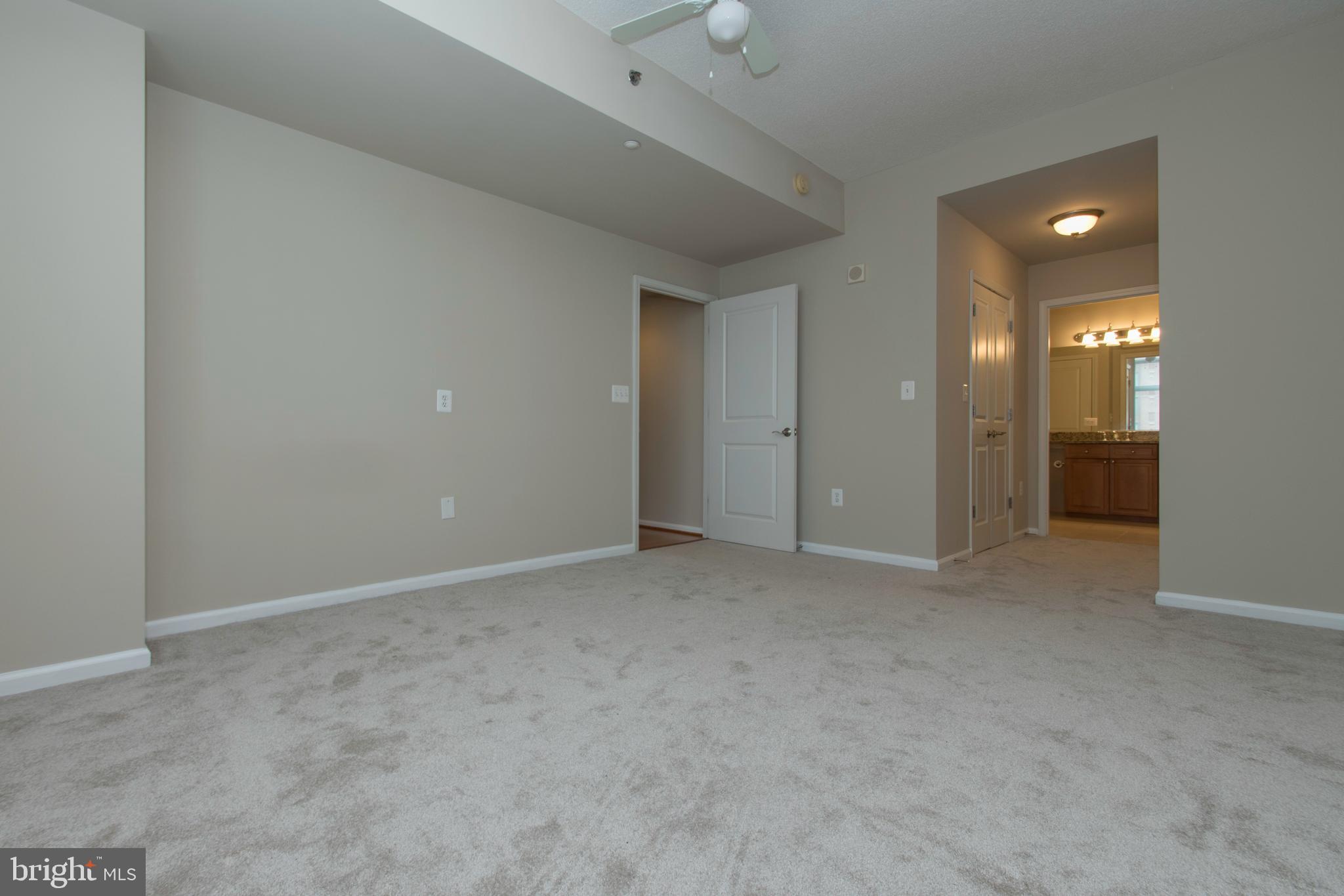 11700 Old Georgetown Road, Unit 807 North Bethesda, MD 20852 - Photo 15 of 37 a view of an empty room and a bathroom