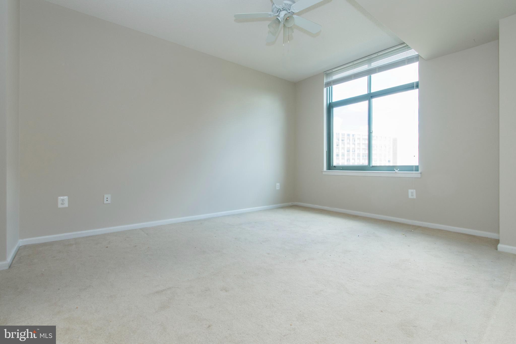 11700 Old Georgetown Road, Unit 807 North Bethesda, MD 20852 - Photo 17 of 37 an empty room with a window