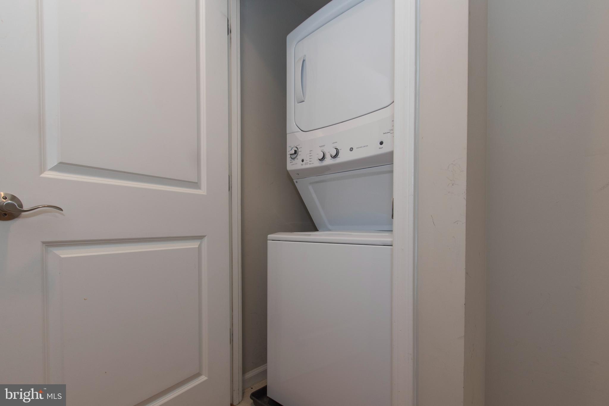 11700 Old Georgetown Road, Unit 807 North Bethesda, MD 20852 - Photo 21 of 37 a utility room with dryer and washer