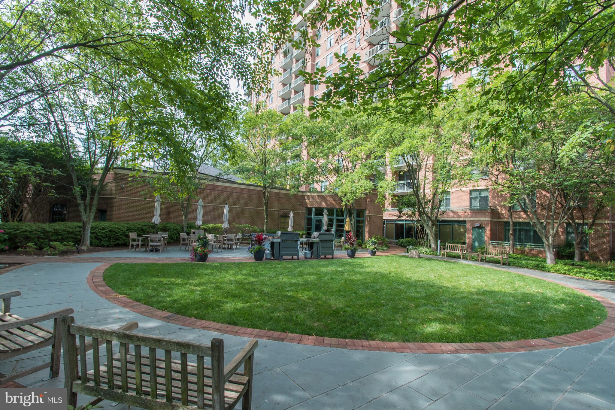 11700 Old Georgetown Road, Unit 807 North Bethesda, MD 20852 - Photo 35 of 37 a view of a chairs and tables in the patio yard