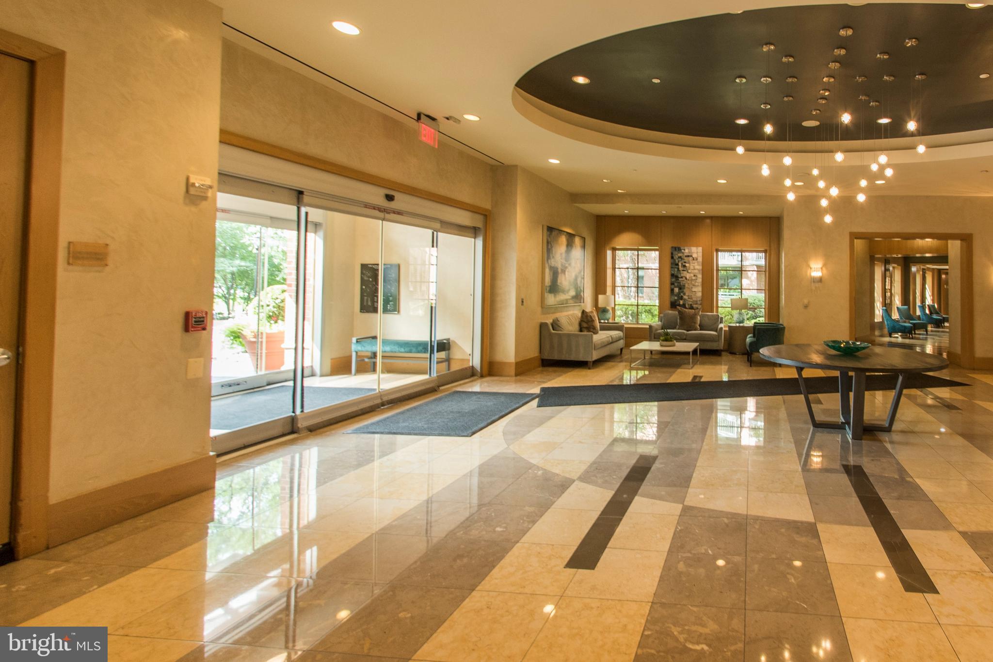 11700 Old Georgetown Road, Unit 807 North Bethesda, MD 20852 - Photo 4 of 37 a view of a lobby with black carpet