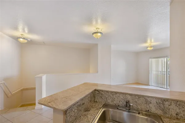 a view of a kitchen cabinets and a sink