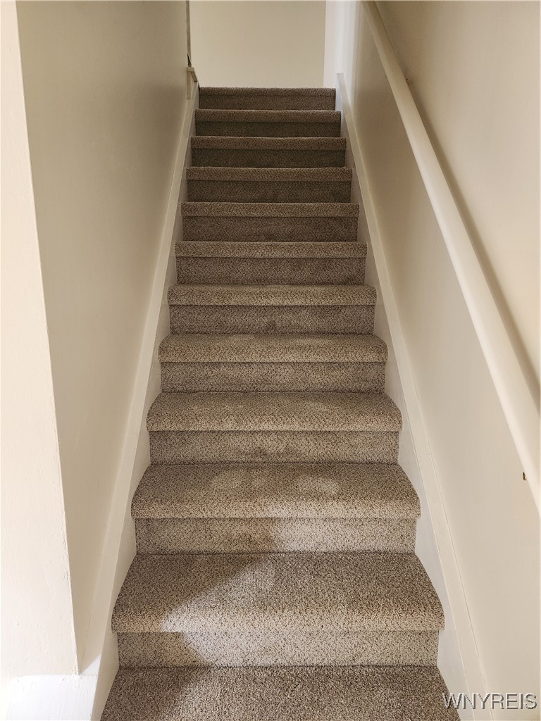 95 Pheasant Run Road Amherst, NY 14228 - Photo 13 of 22 Staircase and entire 2nd floor boast brand new car