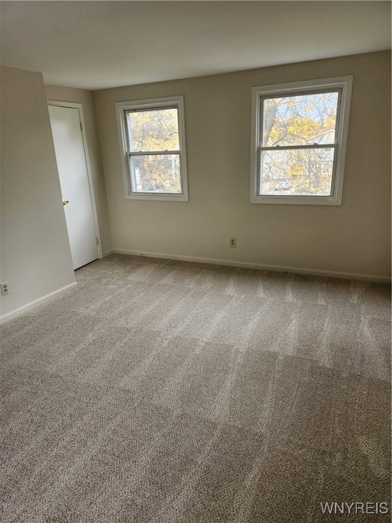 95 Pheasant Run Road Amherst, NY 14228 - Photo 15 of 22 Large bright Primary bedroom with front and side w