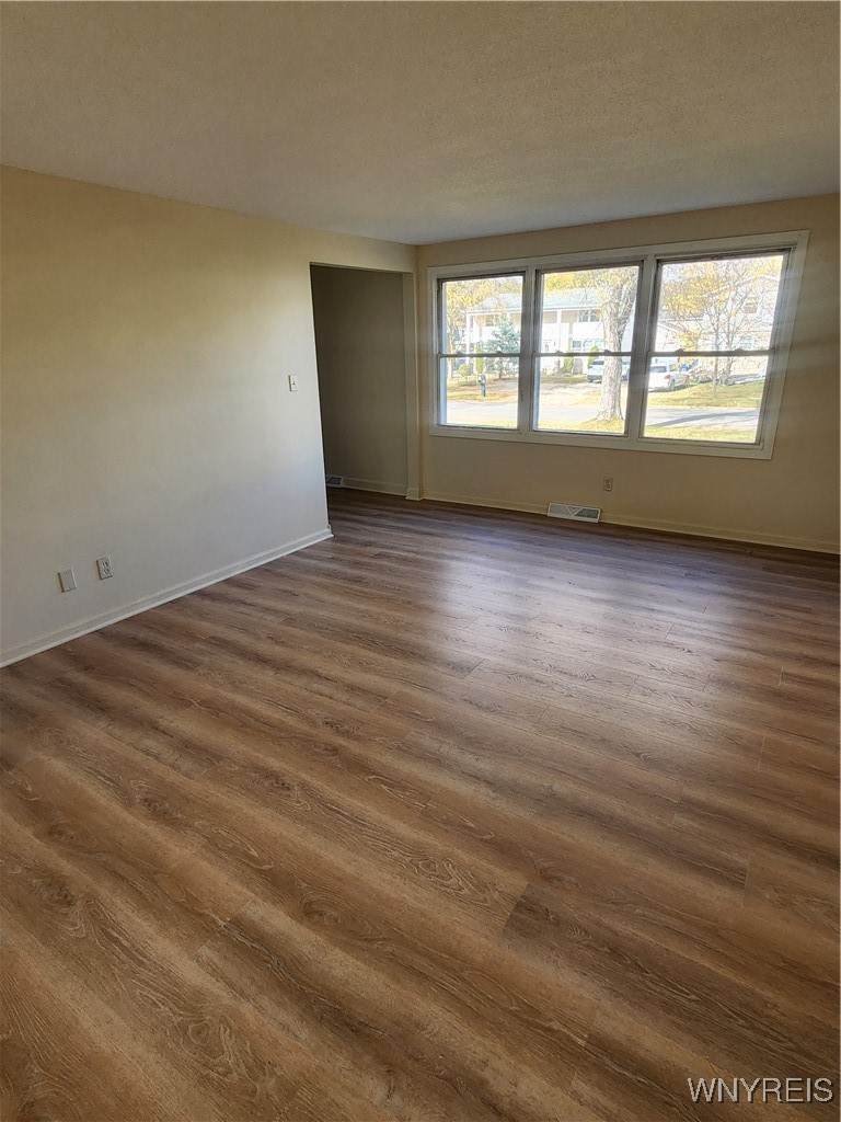 95 Pheasant Run Road Amherst, NY 14228 - Photo 5 of 22 Angle view of large living room with new flooring