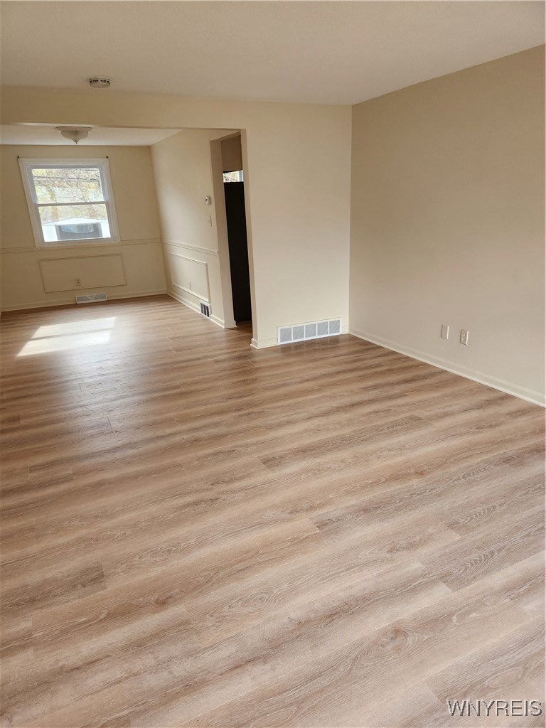 95 Pheasant Run Road Amherst, NY 14228 - Photo 7 of 22 Living room showing dining room and entry to kitch