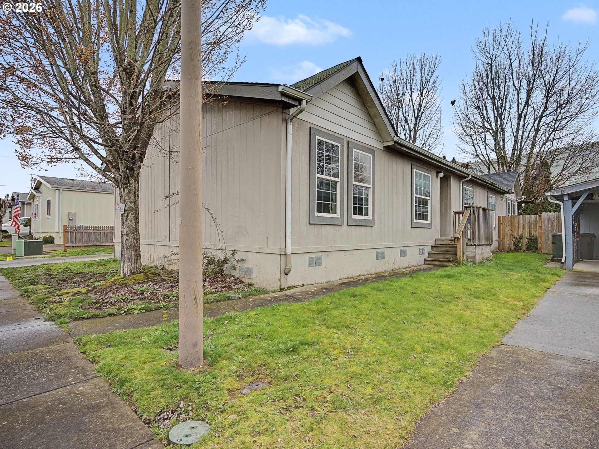 2965 Northeast 206th Place Fairview, OR 97024 - Photo 2 of 44 a front view of a house with a yard