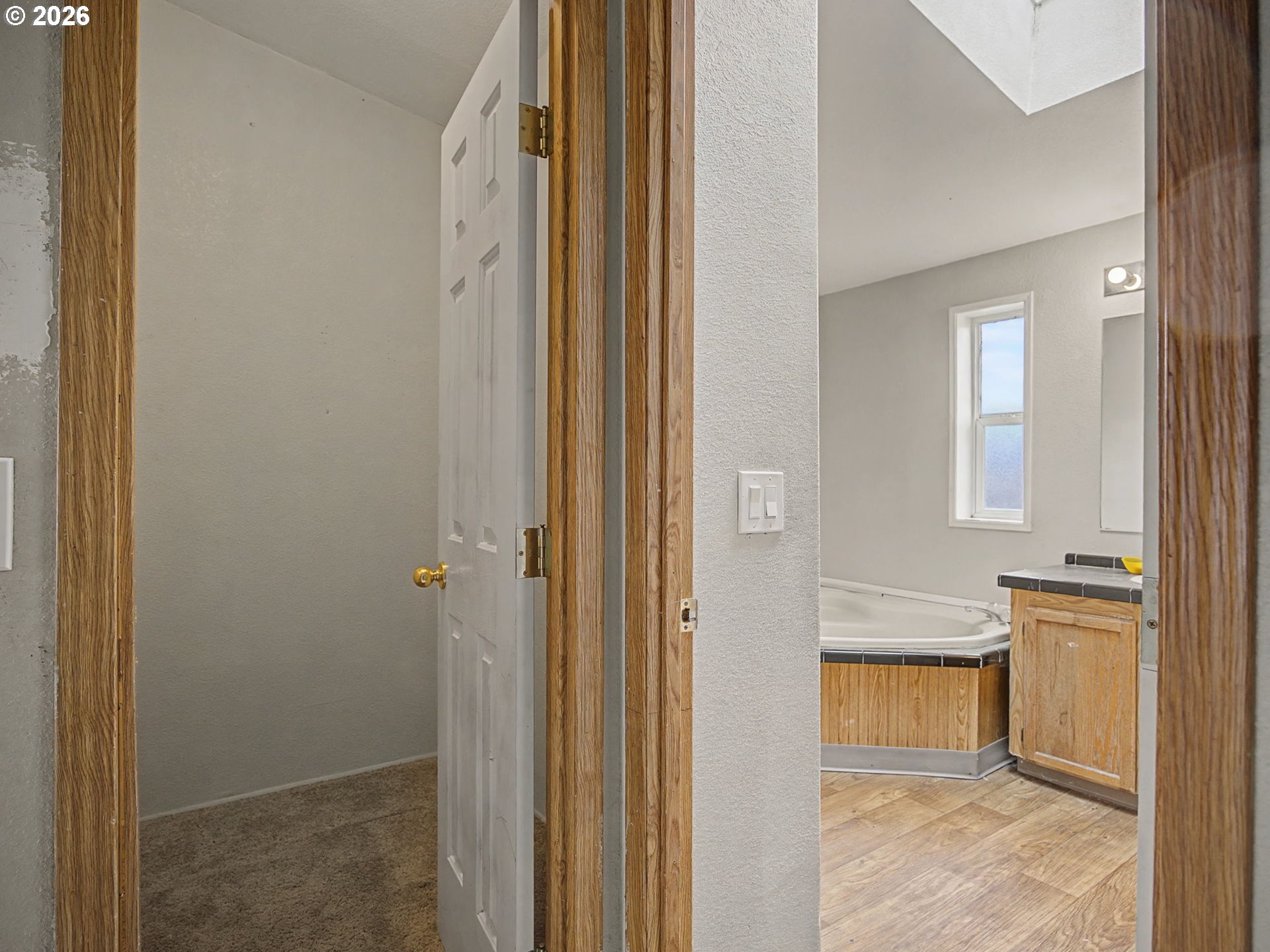 2965 Northeast 206th Place Fairview, OR 97024 - Photo 21 of 44 a view of a bathroom from a corridor