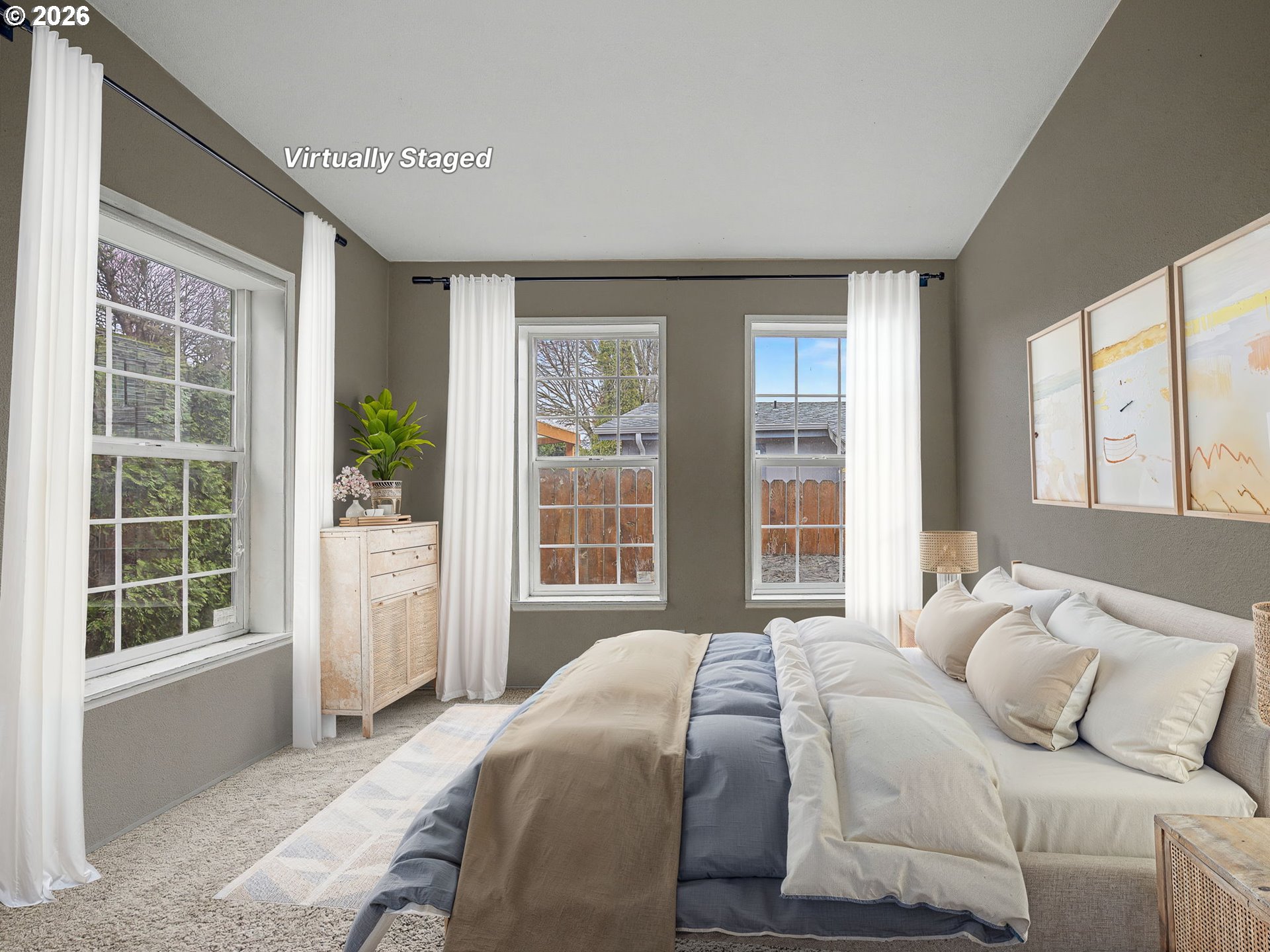 2965 Northeast 206th Place Fairview, OR 97024 - Photo 26 of 44 a bedroom with a large bed and a large window