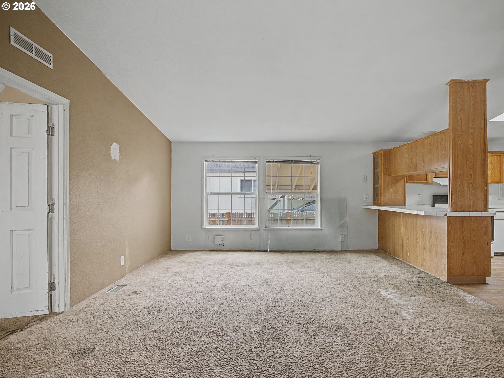 2965 Northeast 206th Place Fairview, OR 97024 - Photo 10 of 44 a view of a big room with windows and chandelier