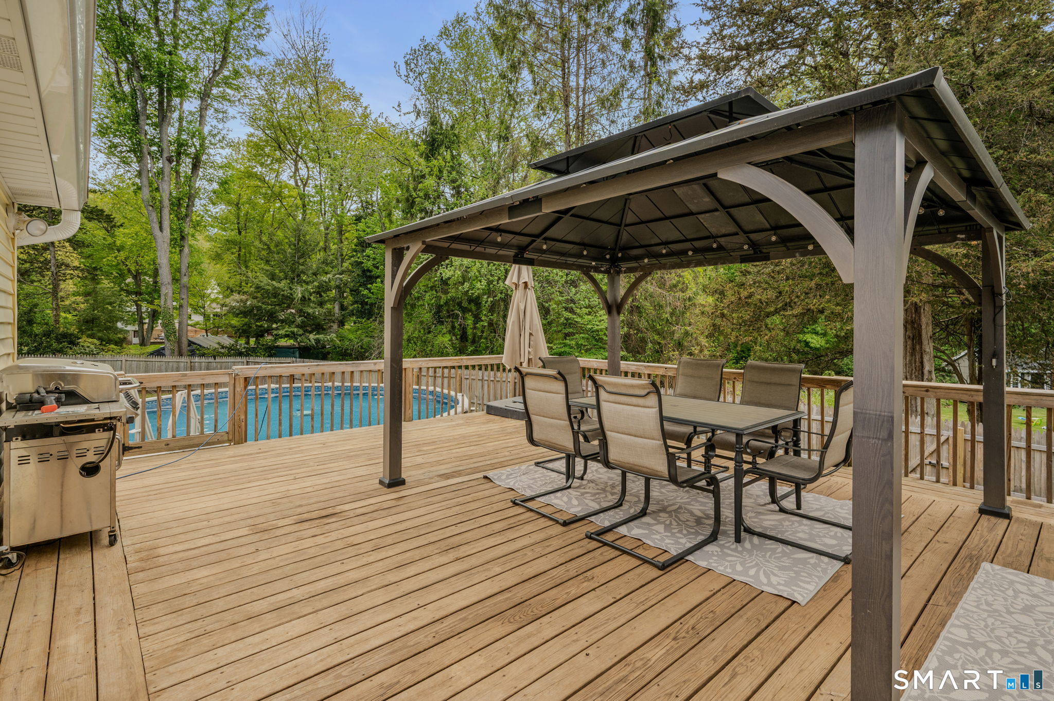 65 Flat Iron Road Guilford, CT 06437 - Photo 26 of 40 back deck and above ground pool