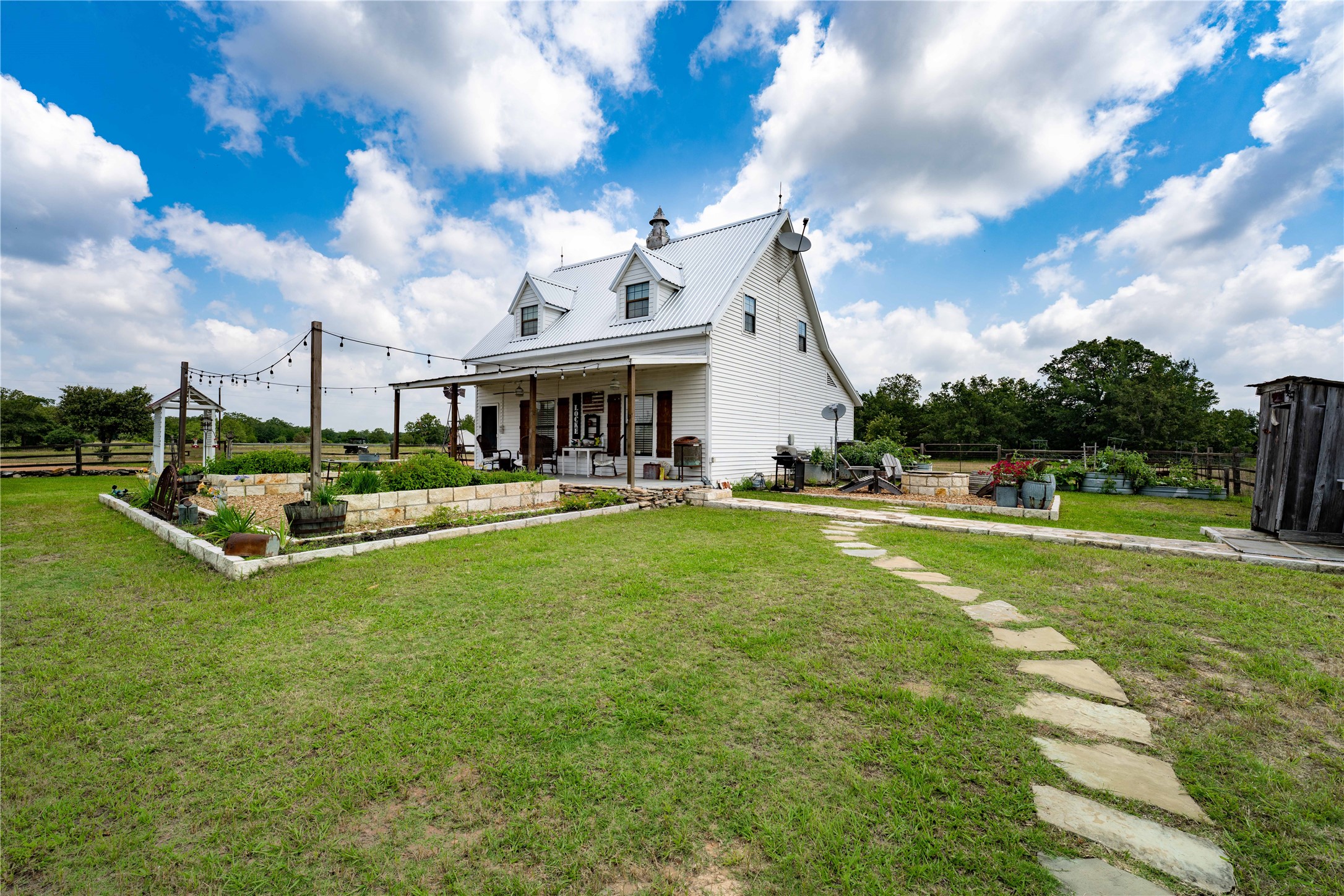5939 Round Top Road Carmine, TX 78932 - Photo 2 of 28 a view of an house with swimming pool and yard