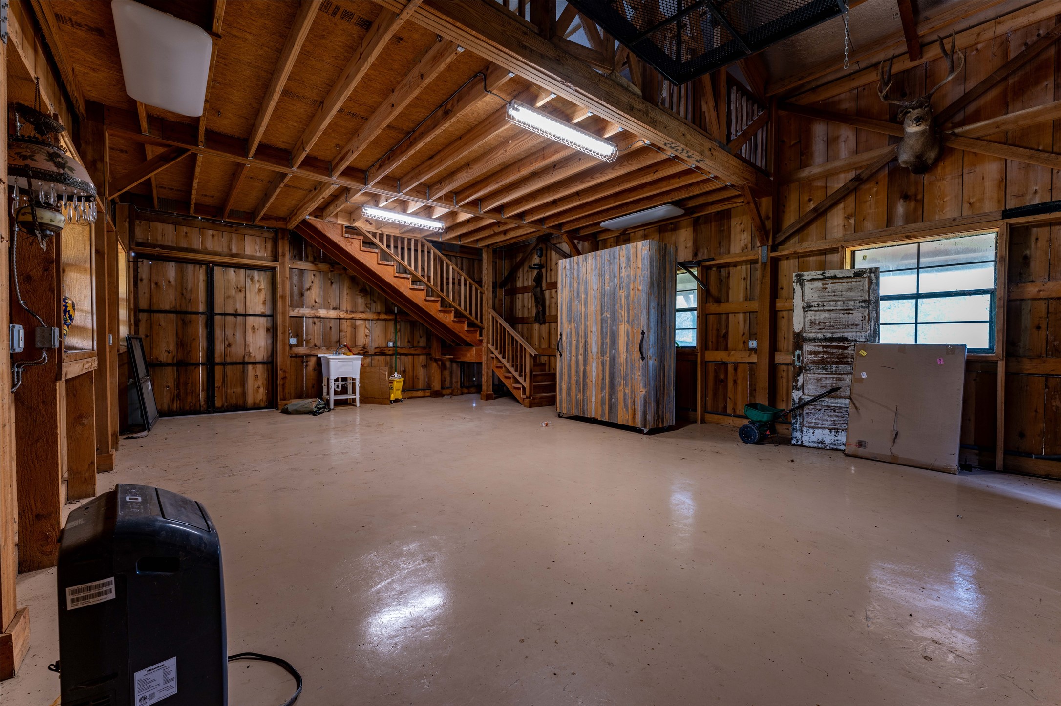 5939 Round Top Road Carmine, TX 78932 - Photo 27 of 28 a view of water heater room with staircase