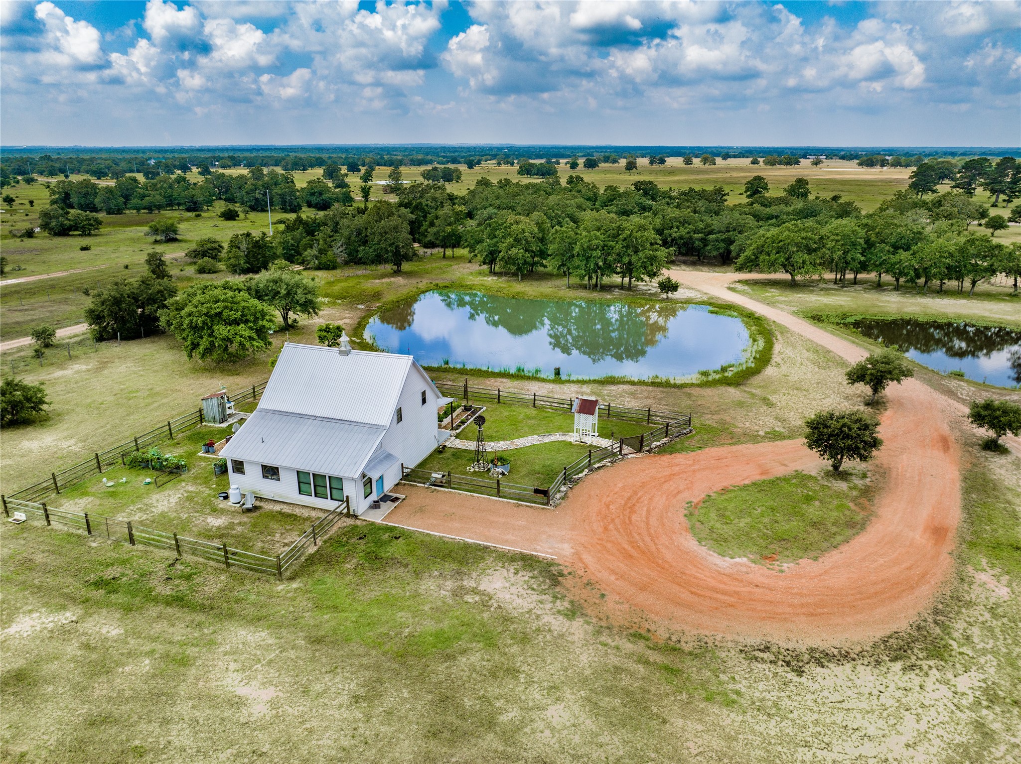 5939 Round Top Road Carmine, TX 78932 - Photo 4 of 28 a swimming pool with outdoor seating and yard