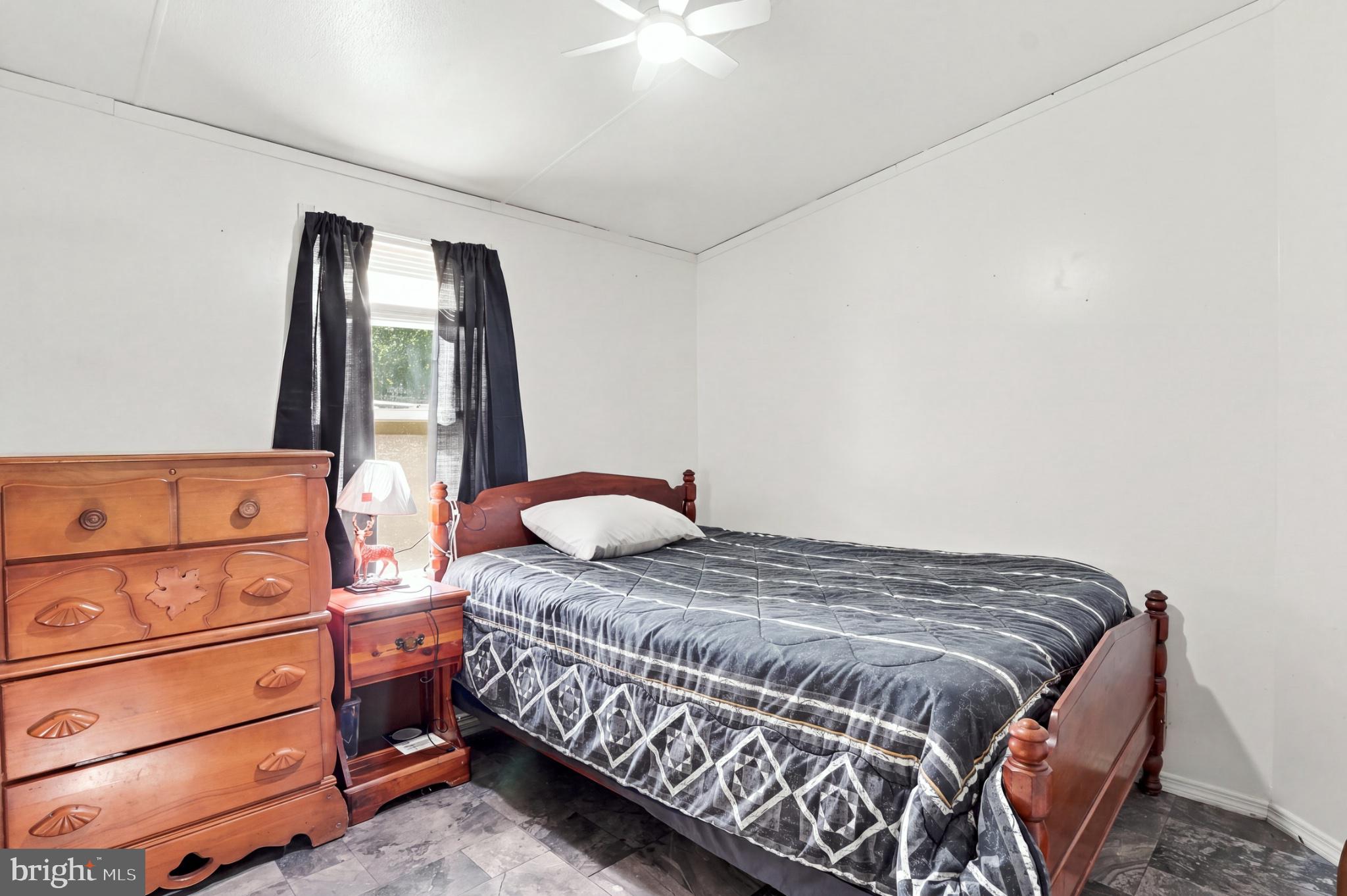 14105 Reva Road Boston, VA 22713 - Photo 23 of 38 Cozy bedroom with natural light.
