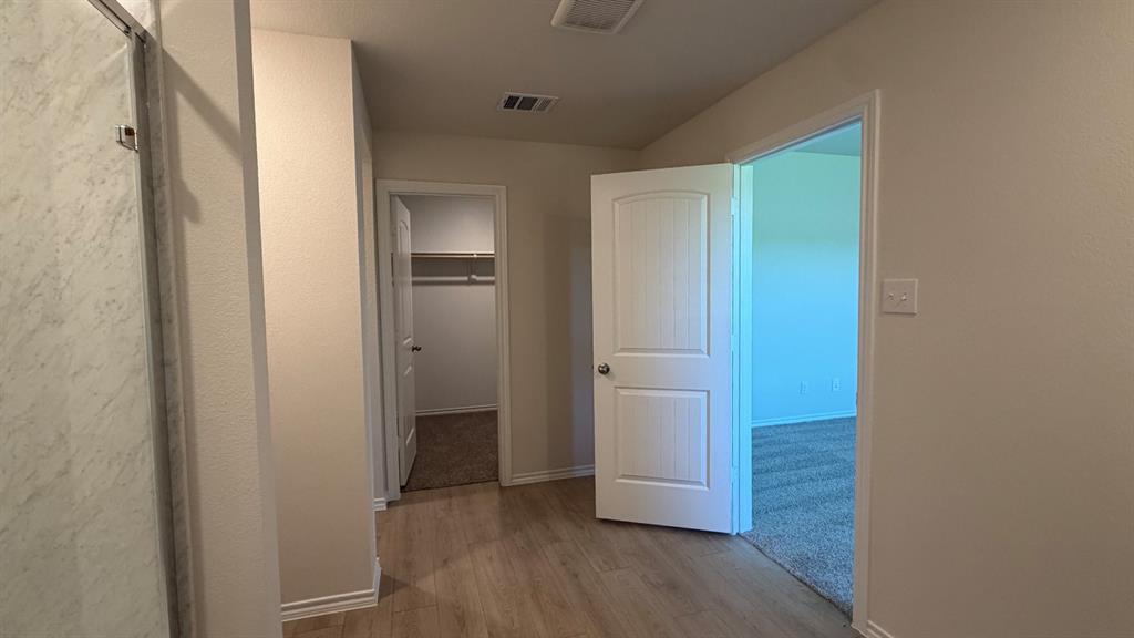 2007 Reveille Way Terrell, TX 75160 - Photo 22 of 31 a view of hallway with wooden floor