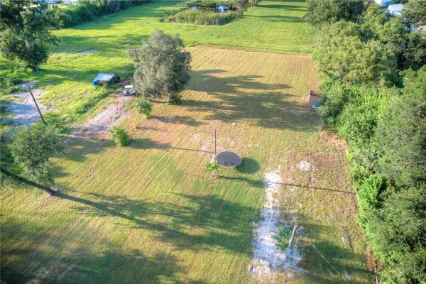 a view of a yard with an outdoor space