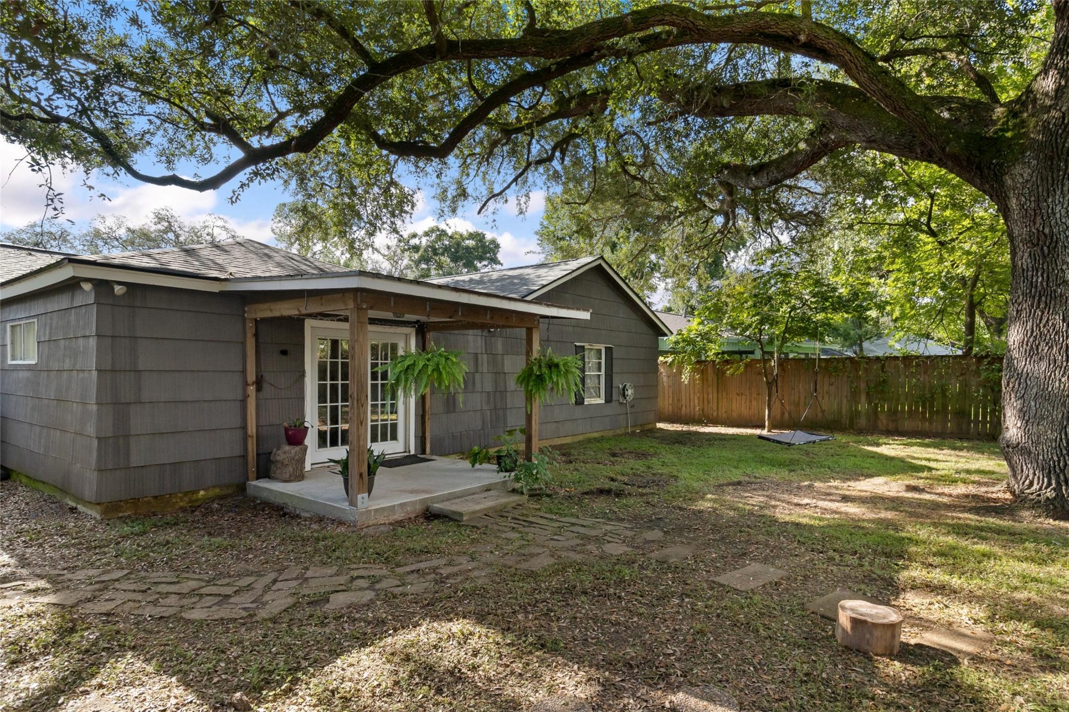 232 Laurel Street Lake Jackson, TX 77566 - Photo 19 of 22 a view of a house with a yard