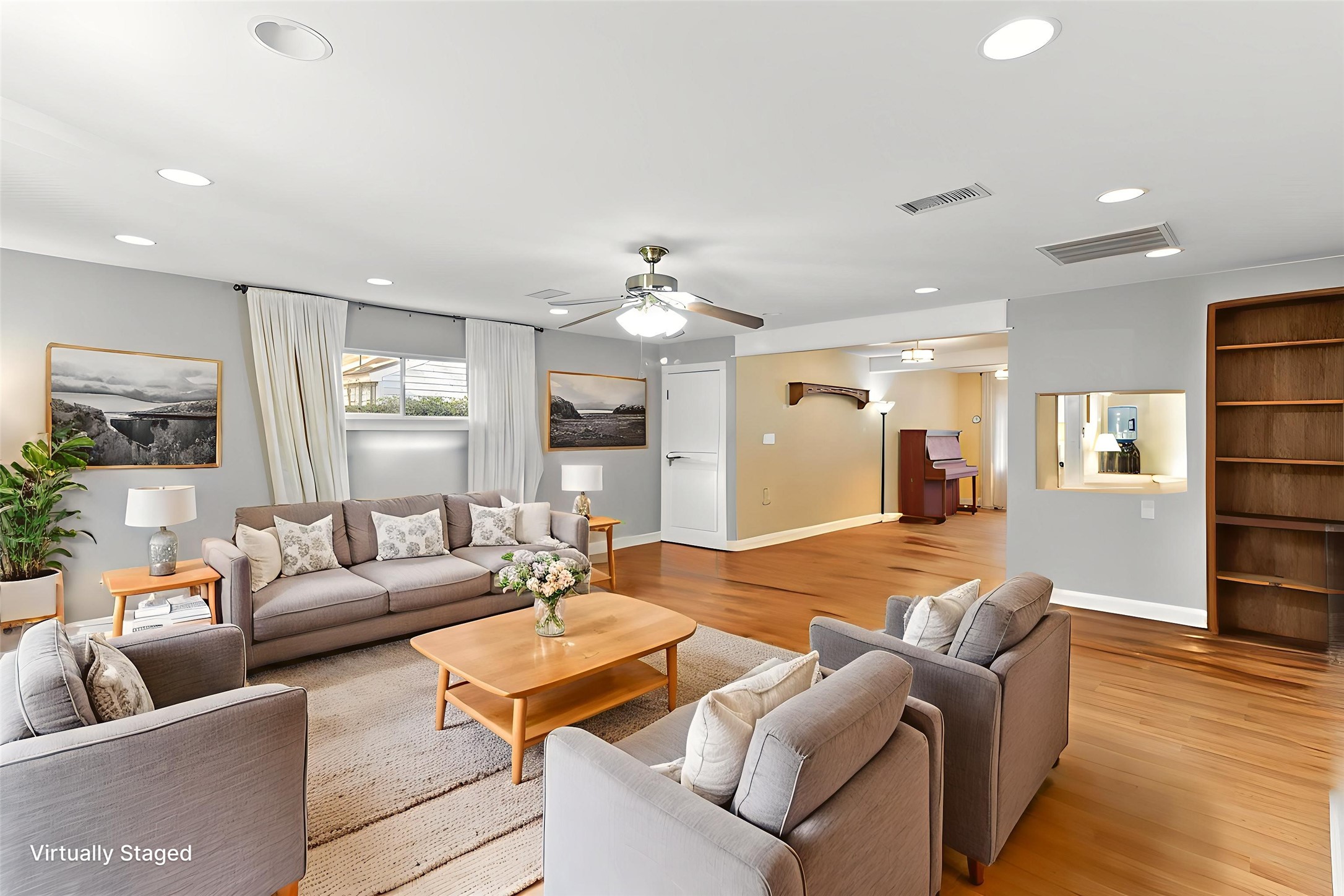 232 Laurel Street Lake Jackson, TX 77566 - Photo 7 of 22 a living room with furniture and wooden floor