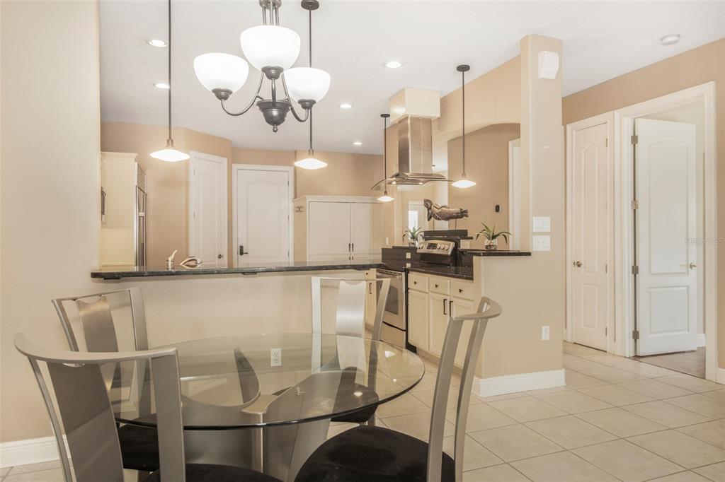 19331 Haskell Place Land O Lakes, FL 34638 - Photo 11 of 34 a view of a dining room with furniture