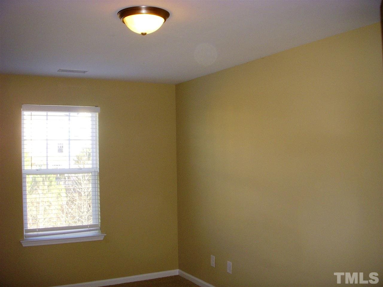 11720 Coppergate Drive, Unit 111 Raleigh, NC 27614 - Photo 12 of 15 a view of a small space with a window
