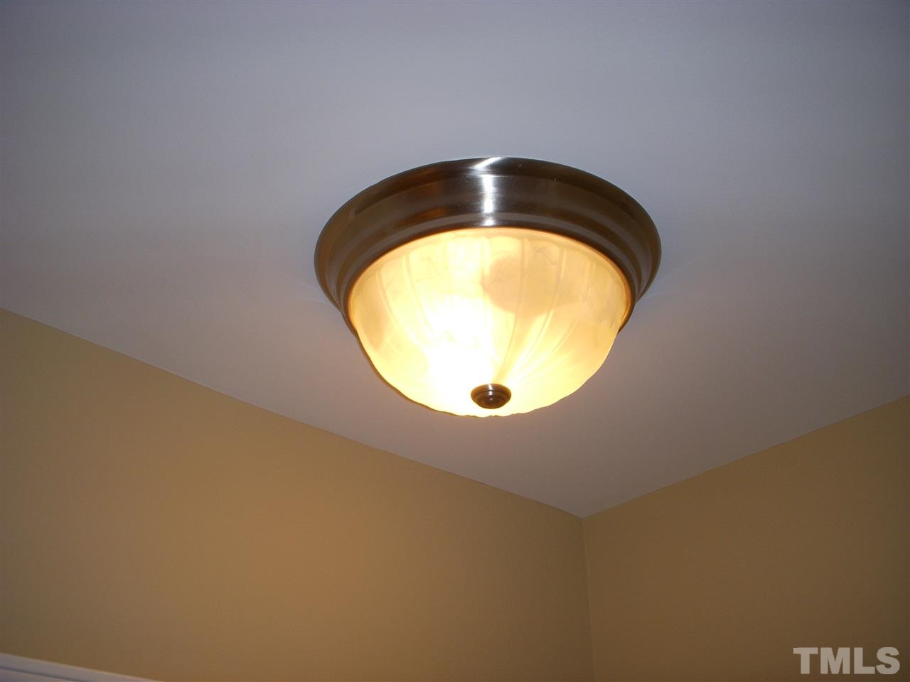 11720 Coppergate Drive, Unit 111 Raleigh, NC 27614 - Photo 14 of 15 an ocean view with a wooden floor and glass of door
