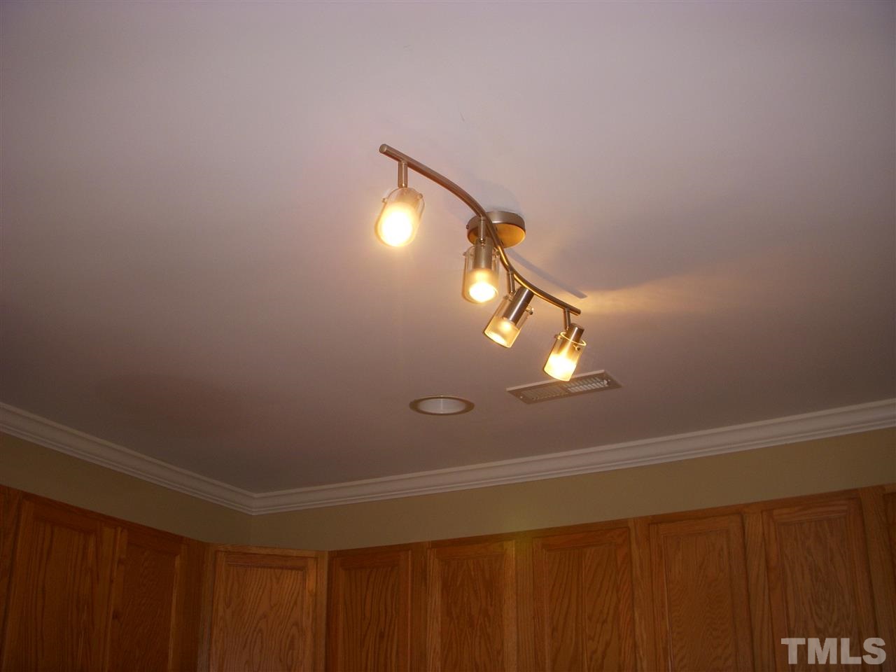 11720 Coppergate Drive, Unit 111 Raleigh, NC 27614 - Photo 5 of 15 a bathroom with a light fixture and a window
