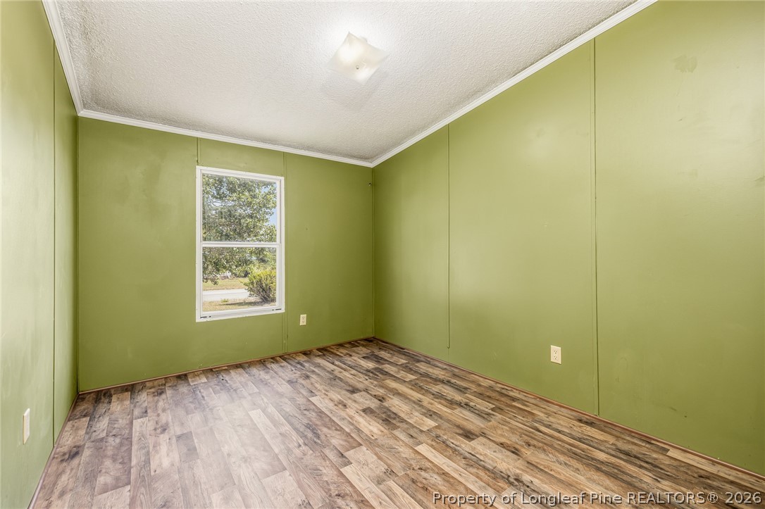 105 Valley Forge Way North Cameron, NC 28326 - Photo 19 of 33 a view of a big room with wooden floor and windows