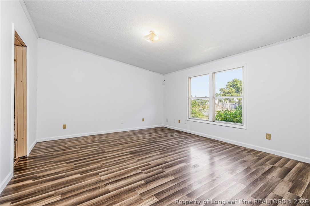 105 Valley Forge Way North Cameron, NC 28326 - Photo 22 of 33 a view of room with window and hardwood floor