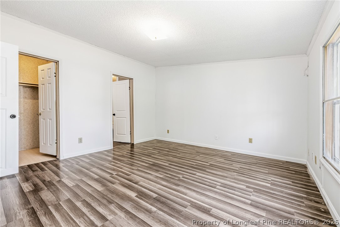 105 Valley Forge Way North Cameron, NC 28326 - Photo 24 of 33 a view of a room with wooden floor and closet