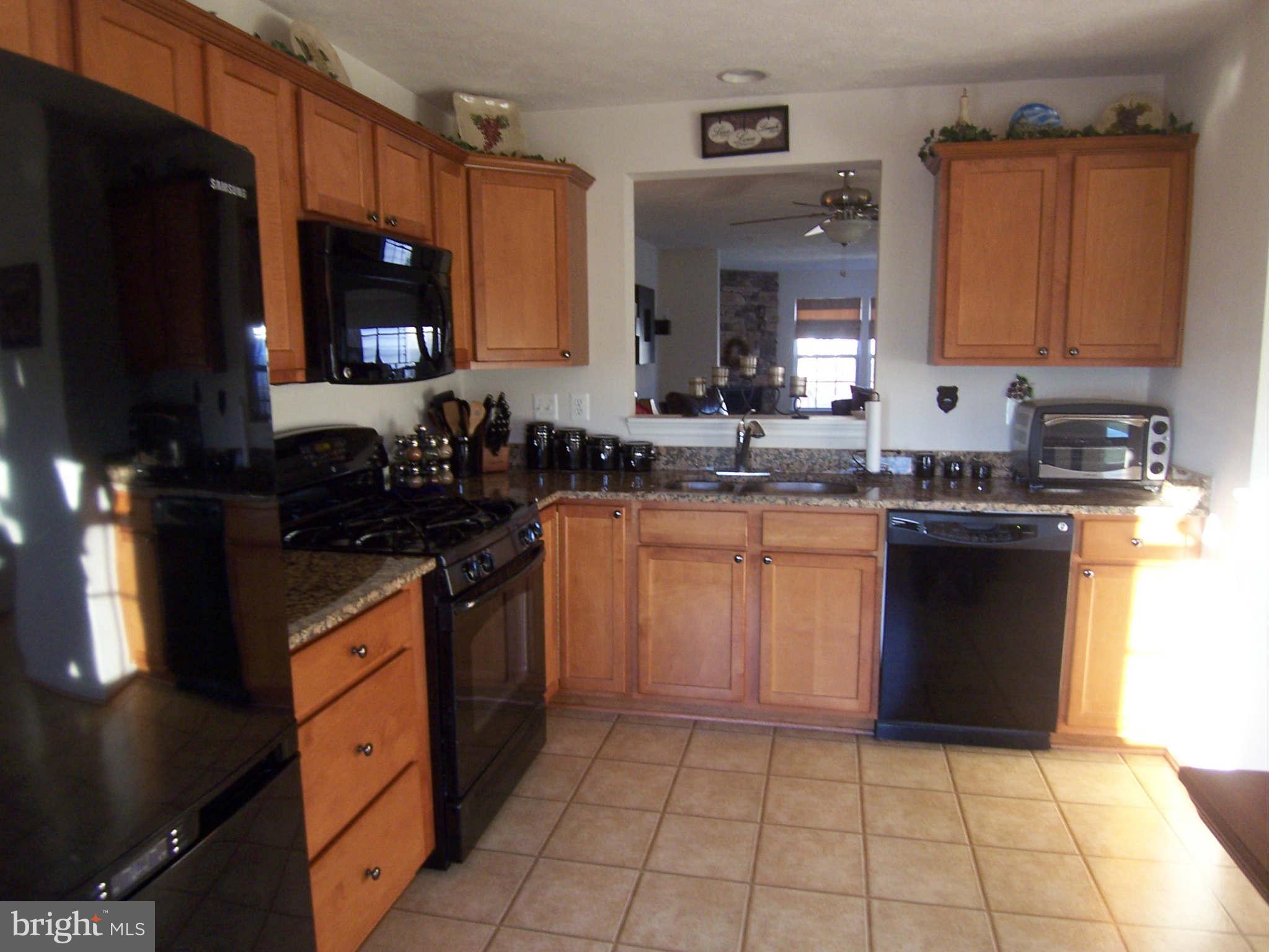 941 Tipton Road Baltimore, MD 21220 - Photo 14 of 22 Kitchen with Granite Counters