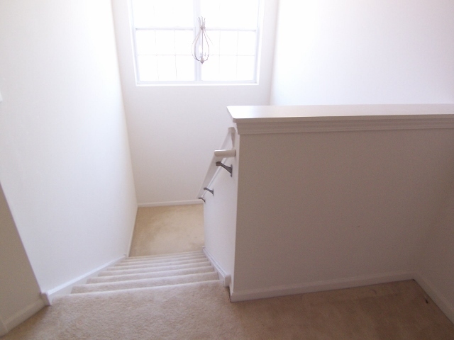 1663 West Turtle Creek Lane Round Lake, IL 60073 - Photo 13 of 25 a view of a room with rack and white walls