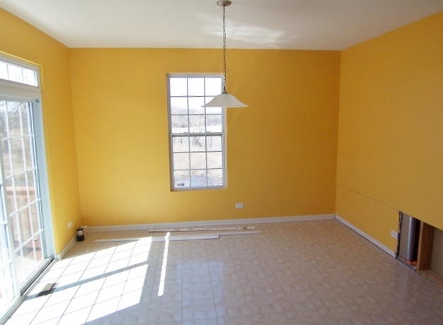 1663 West Turtle Creek Lane Round Lake, IL 60073 - Photo 8 of 25 a view of an empty room with a window