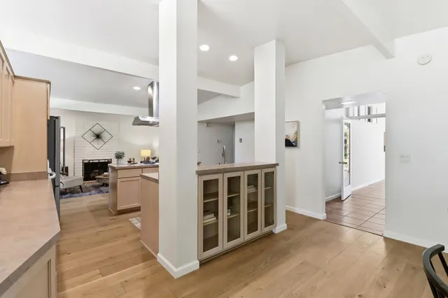 a kitchen with a sink and a refrigerator