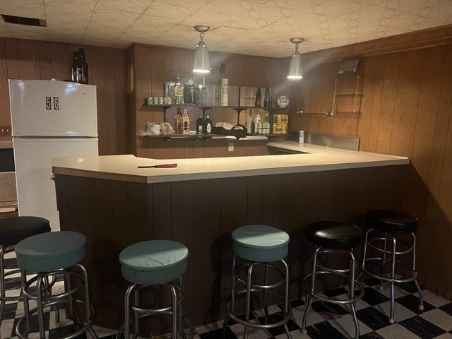 64 Fox Hill Road Springfield, MA 01118 - Photo 11 of 14 a kitchen with stainless steel appliances a dining table and chairs
