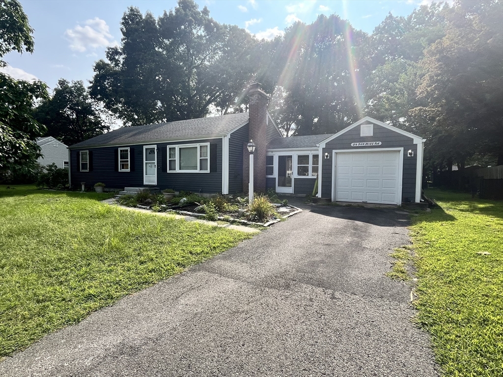 64 Fox Hill Road Springfield, MA 01118 - Photo 3 of 14 a front view of a house with garden
