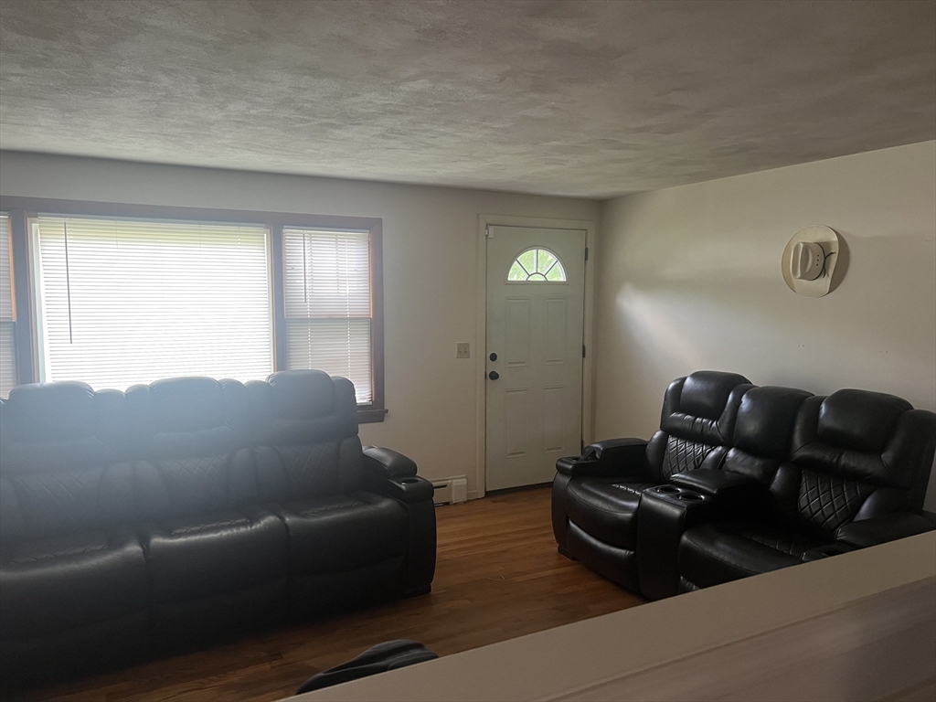 64 Fox Hill Road Springfield, MA 01118 - Photo 5 of 14 a living room with furniture and a window