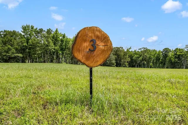 a view of swimming pool from a yard